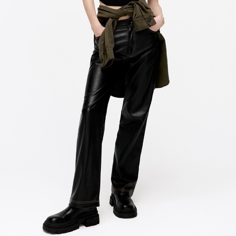 FAUX LEATHER EXPOSED STITCH PANTS